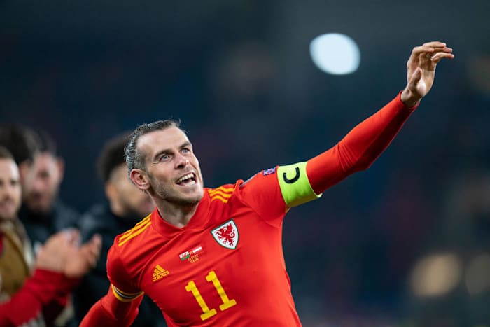Gareth Bale pictured celebrating after helping Wales beat Austria 2-1 in March 2022